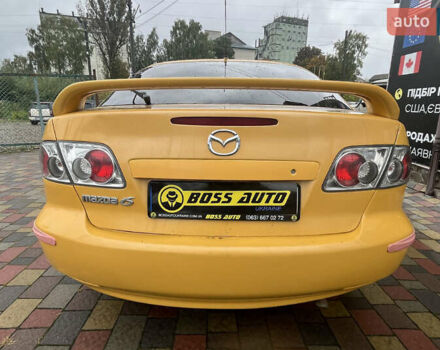 Жовтий Мазда 6, об'ємом двигуна 2 л та пробігом 303 тис. км за 3999 $, фото 4 на Automoto.ua