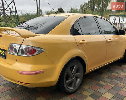 Жовтий Мазда 6, об'ємом двигуна 2 л та пробігом 303 тис. км за 3999 $, фото 5 на Automoto.ua