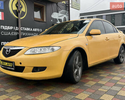 Жовтий Мазда 6, об'ємом двигуна 2 л та пробігом 303 тис. км за 3999 $, фото 2 на Automoto.ua