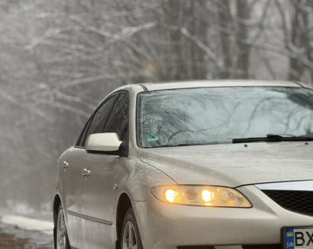 Желтый Мазда 6, объемом двигателя 2 л и пробегом 260 тыс. км за 3350 $, фото 1 на Automoto.ua