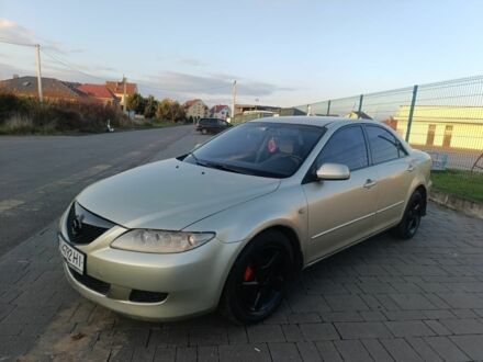 Жовтий Мазда 6, об'ємом двигуна 2 л та пробігом 330 тис. км за 3399 $, фото 1 на Automoto.ua