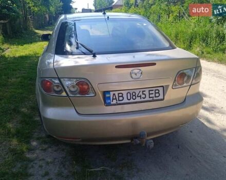 Желтый Мазда 6, объемом двигателя 2 л и пробегом 325 тыс. км за 3000 $, фото 1 на Automoto.ua