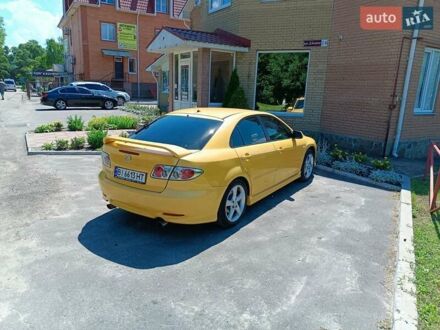 Желтый Мазда 6, объемом двигателя 2.26 л и пробегом 214 тыс. км за 5100 $, фото 1 на Automoto.ua