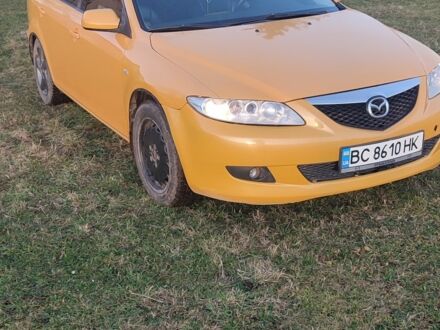 Желтый Мазда 6, объемом двигателя 2 л и пробегом 303 тыс. км за 3700 $, фото 1 на Automoto.ua