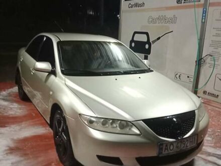 Желтый Мазда 6, объемом двигателя 2 л и пробегом 340 тыс. км за 3600 $, фото 1 на Automoto.ua