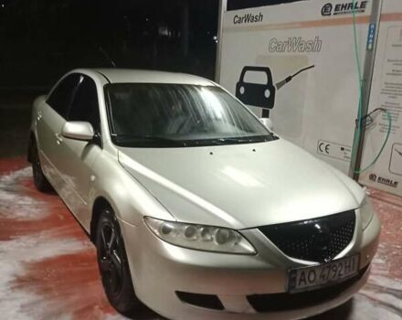 Желтый Мазда 6, объемом двигателя 2 л и пробегом 340 тыс. км за 3600 $, фото 1 на Automoto.ua