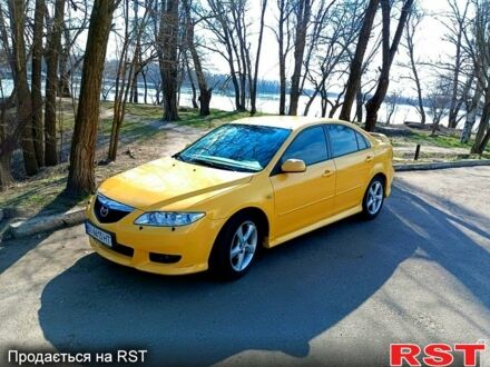 Желтый Мазда 6, объемом двигателя 2.3 л и пробегом 214 тыс. км за 4500 $, фото 1 на Automoto.ua