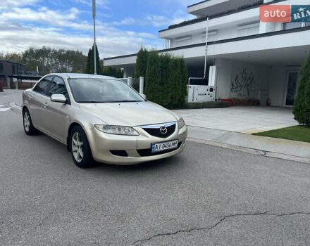 Желтый Мазда 6, объемом двигателя 1.99 л и пробегом 284 тыс. км за 4400 $, фото 1 на Automoto.ua