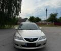 Серый Мазда 6, объемом двигателя 1.8 л и пробегом 291 тыс. км за 3900 $, фото 1 на Automoto.ua