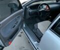 Серый Мазда 6, объемом двигателя 2 л и пробегом 350 тыс. км за 900 $, фото 1 на Automoto.ua