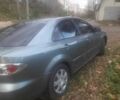 Серый Мазда 6, объемом двигателя 2 л и пробегом 313 тыс. км за 4000 $, фото 1 на Automoto.ua