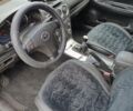 Серый Мазда 6, объемом двигателя 2 л и пробегом 387 тыс. км за 2800 $, фото 1 на Automoto.ua