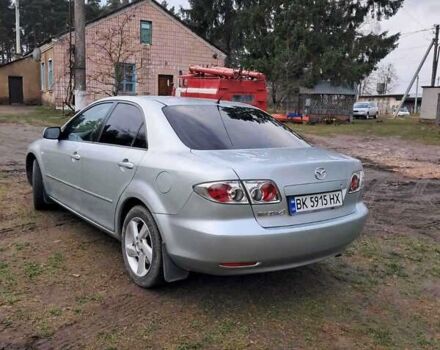 Серый Мазда 6, объемом двигателя 2 л и пробегом 288 тыс. км за 3500 $, фото 4 на Automoto.ua