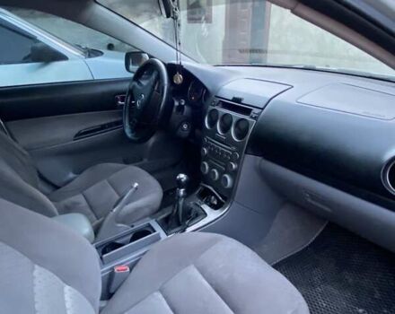 Серый Мазда 6, объемом двигателя 2 л и пробегом 250 тыс. км за 3600 $, фото 2 на Automoto.ua