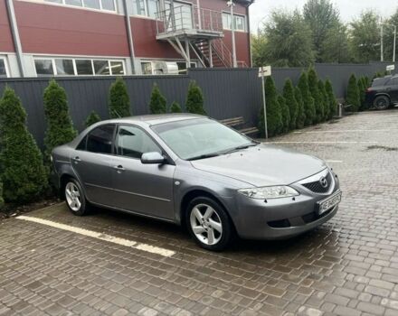 Серый Мазда 6, объемом двигателя 2 л и пробегом 306 тыс. км за 4900 $, фото 2 на Automoto.ua