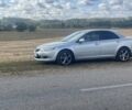 Серый Мазда 6, объемом двигателя 2 л и пробегом 327 тыс. км за 4000 $, фото 1 на Automoto.ua