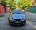 Серый Мазда 6, объемом двигателя 1.8 л и пробегом 245 тыс. км за 3800 $, фото 1 на Automoto.ua