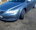 Серый Мазда 6, объемом двигателя 1.8 л и пробегом 320 тыс. км за 3600 $, фото 1 на Automoto.ua