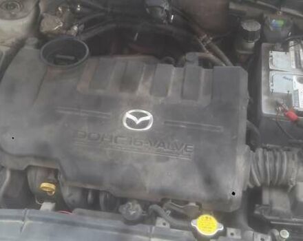 Сірий Мазда 6, об'ємом двигуна 2 л та пробігом 260 тис. км за 3100 $, фото 1 на Automoto.ua