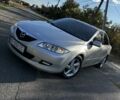 Серый Мазда 6, объемом двигателя 1.8 л и пробегом 232 тыс. км за 3850 $, фото 1 на Automoto.ua
