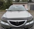 Серый Мазда 6, объемом двигателя 2 л и пробегом 250 тыс. км за 3500 $, фото 1 на Automoto.ua