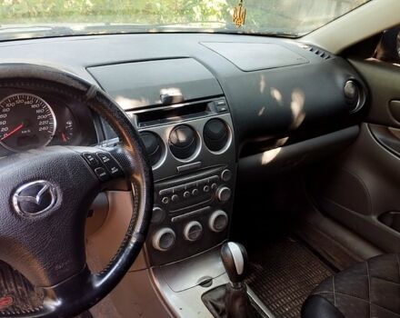 Серый Мазда 6, объемом двигателя 2 л и пробегом 182 тыс. км за 3000 $, фото 1 на Automoto.ua