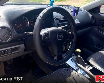 Серый Мазда 6, объемом двигателя 2 л и пробегом 270 тыс. км за 4200 $, фото 2 на Automoto.ua