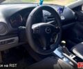Серый Мазда 6, объемом двигателя 2 л и пробегом 270 тыс. км за 4200 $, фото 2 на Automoto.ua