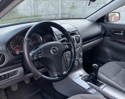 Серый Мазда 6, объемом двигателя 2 л и пробегом 412 тыс. км за 4000 $, фото 1 на Automoto.ua