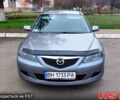 Серый Мазда 6, объемом двигателя 2 л и пробегом 325 тыс. км за 3700 $, фото 1 на Automoto.ua