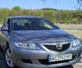 Серый Мазда 6, объемом двигателя 2 л и пробегом 350 тыс. км за 2850 $, фото 1 на Automoto.ua