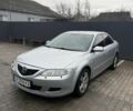 Серый Мазда 6, объемом двигателя 2 л и пробегом 390 тыс. км за 2100 $, фото 1 на Automoto.ua