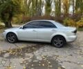 Серый Мазда 6, объемом двигателя 2 л и пробегом 255 тыс. км за 4500 $, фото 1 на Automoto.ua