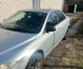 Серый Мазда 6, объемом двигателя 1.8 л и пробегом 251 тыс. км за 3800 $, фото 1 на Automoto.ua