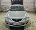 Серый Мазда 6, объемом двигателя 2 л и пробегом 256 тыс. км за 4200 $, фото 1 на Automoto.ua