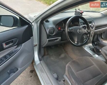 Серый Мазда 6, объемом двигателя 1.8 л и пробегом 415 тыс. км за 3000 $, фото 6 на Automoto.ua