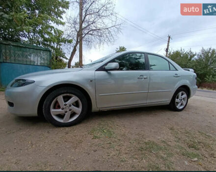 Серый Мазда 6, объемом двигателя 2 л и пробегом 255 тыс. км за 3650 $, фото 1 на Automoto.ua