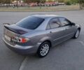 Серый Мазда 6, объемом двигателя 2 л и пробегом 295 тыс. км за 2710 $, фото 4 на Automoto.ua