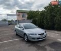 Серый Мазда 6, объемом двигателя 2 л и пробегом 257 тыс. км за 2800 $, фото 1 на Automoto.ua