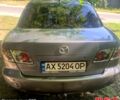 Серый Мазда 6, объемом двигателя 2 л и пробегом 300 тыс. км за 5000 $, фото 1 на Automoto.ua