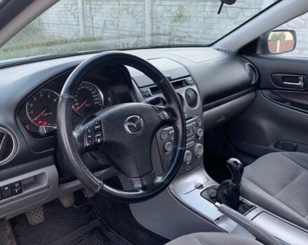 Серый Мазда 6, объемом двигателя 2 л и пробегом 412 тыс. км за 4000 $, фото 1 на Automoto.ua