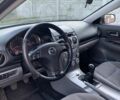 Серый Мазда 6, объемом двигателя 2 л и пробегом 412 тыс. км за 4000 $, фото 1 на Automoto.ua