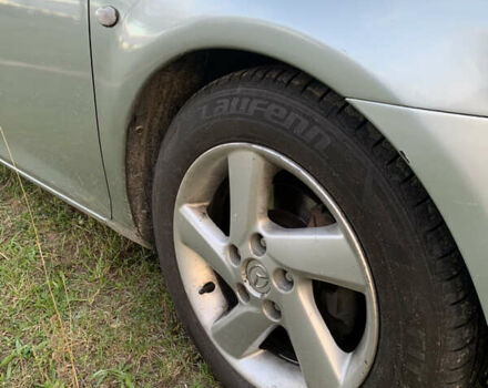 Серый Мазда 6, объемом двигателя 2 л и пробегом 412 тыс. км за 4000 $, фото 4 на Automoto.ua
