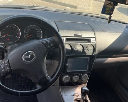 Серый Мазда 6, объемом двигателя 2 л и пробегом 275 тыс. км за 3000 $, фото 6 на Automoto.ua