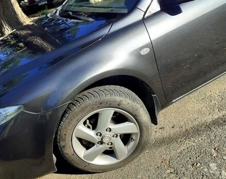 Серый Мазда 6, объемом двигателя 1.8 л и пробегом 408 тыс. км за 4800 $, фото 4 на Automoto.ua