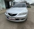 Серый Мазда 6, объемом двигателя 2 л и пробегом 250 тыс. км за 4300 $, фото 1 на Automoto.ua