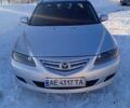 Серый Мазда 6, объемом двигателя 2 л и пробегом 360 тыс. км за 4700 $, фото 1 на Automoto.ua