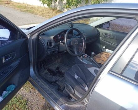 Серый Мазда 6, объемом двигателя 2 л и пробегом 112 тыс. км за 3300 $, фото 4 на Automoto.ua