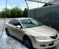 Серый Мазда 6, объемом двигателя 2 л и пробегом 300 тыс. км за 3000 $, фото 2 на Automoto.ua