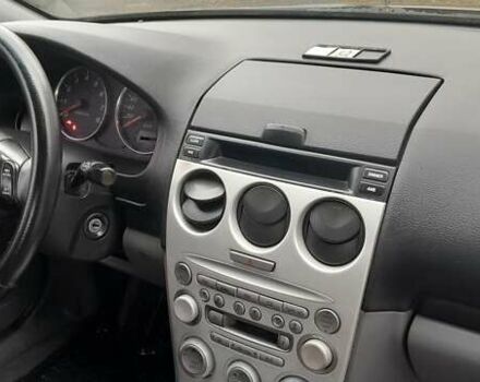 Серый Мазда 6, объемом двигателя 1.8 л и пробегом 290 тыс. км за 3500 $, фото 1 на Automoto.ua